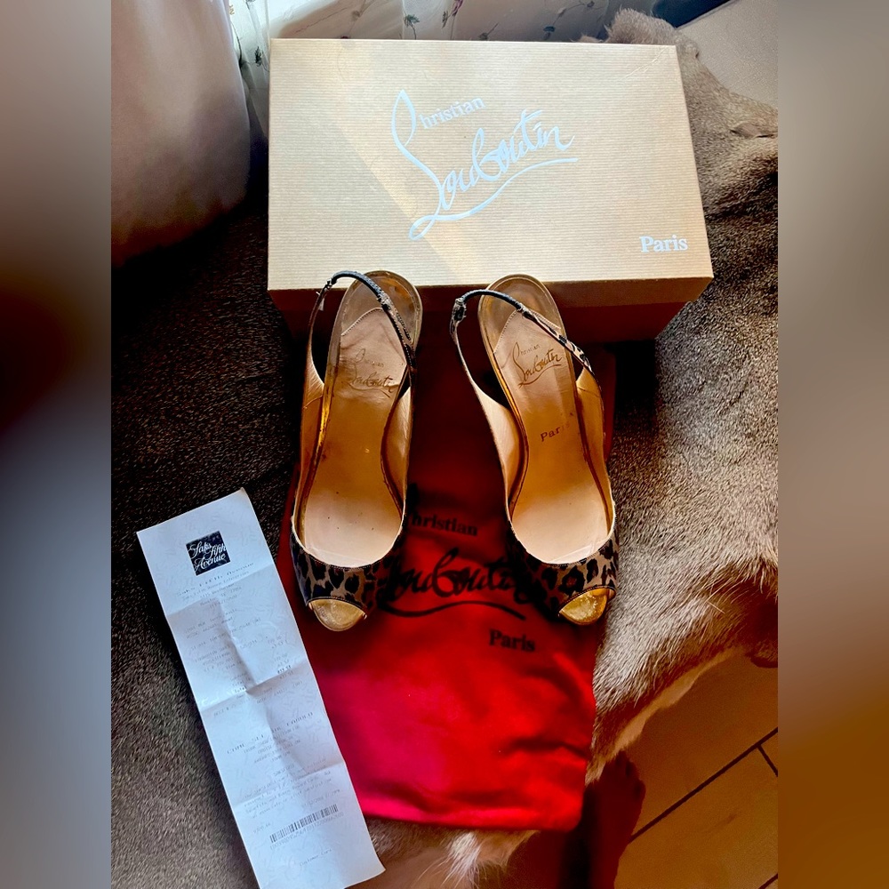 Authentic Christian Louboutin leopard print with peep toe